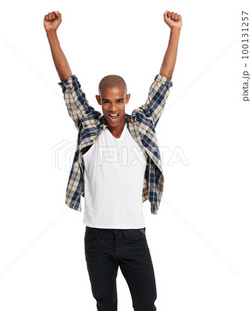 Winner, portrait and black man celebration of success, motivation and bonus deal on white background. Happy male model celebrate achievement, winning lotto competition and excited sale announcement 100131257