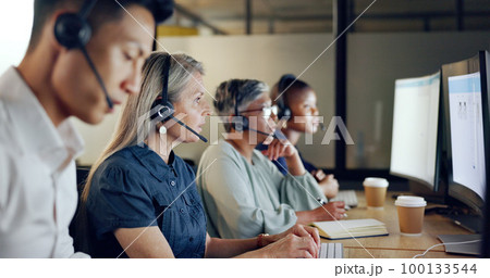Senior call center consultant, woman and contact us, CRM and talking in customer service, computer at desk. Phone call, telemarketing and diversity, writing in notebook in coworking space and headset Senior call center consultant, woman and contact us, CRM and talking in customer service, computer at desk. Phone call, telemarketing and diversity, writing in notebook in coworking space and headset 100133544