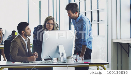 Collaboration, management and team working together on a web design at a startup company office using internet. Group, teamwork and business people using computer for developers of idea 100136856