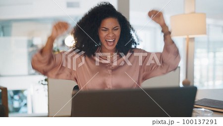 Celebration, happy and business woman in the office reading good news for job promotion on her laptop. Winner, happiness and professional female employee celebrate success in the workplace in Mexico. Celebration, happy and business woman in the office reading good news for job promotion on her laptop. Winner, happiness and professional female employee celebrate success in the workplace in Mexico. 100137291