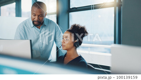 Call center, black man and training woman, telemarketing intern and crm customer service consultant on computer software in office agency. Business people, sales mentor and coaching for tech solution 100139159
