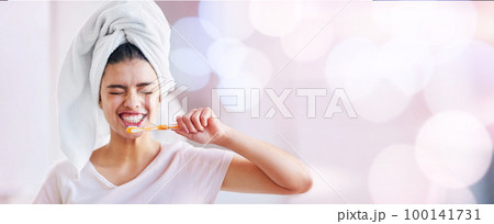 Woman, brushing teeth and smile by copy space mockup, bokeh and happiness for dental wellness. Gen z girl, toothbrush and mock up for happiness, start morning and healthy mouth in bathroom 100141731