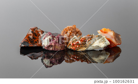 Group of Stones and Minerals on Reflective Surface 100162631