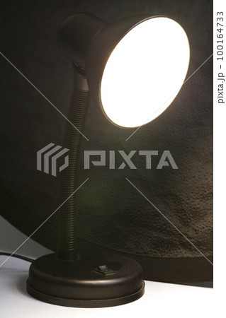 Included table lamp on a black background Included table lamp on a black background 100164733