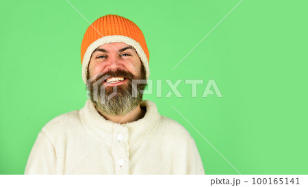 Lets celebrate. cold and flu. Portrait of brutal man in fleece sweatshirt. Handsome male model wearing warm hat. casual man in winter hat and warm clothes. happy hipster wear warm hat. copy space Lets celebrate. cold and flu. Portrait of brutal man in fleece sweatshirt. Handsome male model wearing warm hat. casual man in winter hat and warm clothes. happy hipster wear warm hat. copy space 100165141