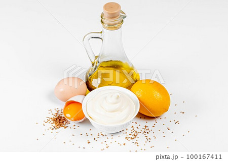 mayonnaise with ingredients on white background mayonnaise with ingredients on white background 100167411