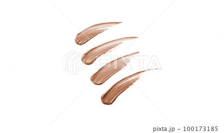 Tone cream or foundation, concealer smear stroke smudge isolated on white Tone cream or foundation, concealer smear stroke smudge isolated on white 100173185