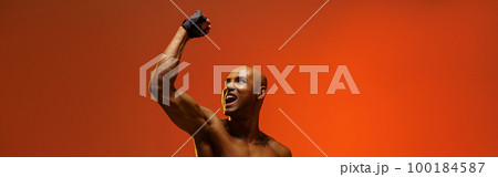 Muscular man doing exercise with weight dumbbells on studio background. Strength and motivation 100184587