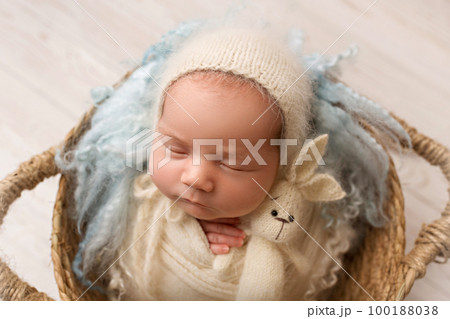 Top view of a newborn baby girl sleeping in a...の写真素材