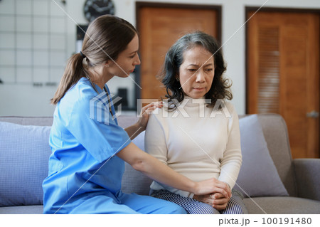 Portrait of a female doctor holding a patient's hand to encourage the fight against disease Portrait of a female doctor holding a patient's hand to encourage the fight against disease 100191480