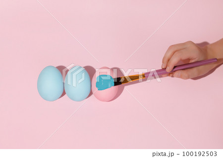 Three colored eggs in a row flat layer. Three colored eggs in a row flat layer. 100192503