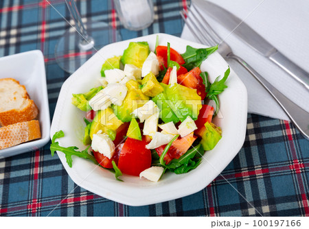 Fresh summer salad with vegetables and cheese 100197166