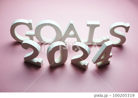 Goals for 2024 alphabet letter on pink background 100205319