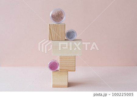 Cosmetic shades compact and loose mineral face powder makeup - Natural eco friendly make up products concept. Eyeshadows and blush Cosmetic shades compact and loose mineral face powder makeup - Natural eco friendly make up products concept. Eyeshadows and blush 100225005