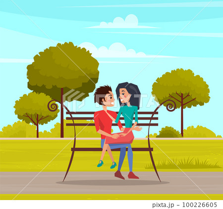 Couple on romantic date outdoors sitting on bench together. Girl and guy spend time in city garden Couple on romantic date outdoors sitting on bench together. Girl and guy spend time in city garden 100226605