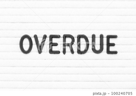 Black color letter in word overdue on white felt board background Black color letter in word overdue on white felt board background 100240705