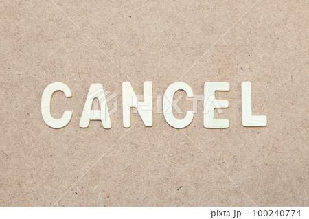 Wood alphabet letter in word cancel on wood background 100240774