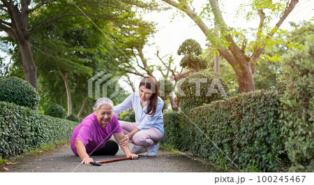Asian senior woman fell down on lying floor because faint and limb weakness and Crying in pain form accident and her daughter came to help support. Concept of old elderly insurance and health care Asian senior woman fell down on lying floor because faint and limb weakness and Crying in pain form accident and her daughter came to help support. Concept of old elderly insurance and health care 100245467