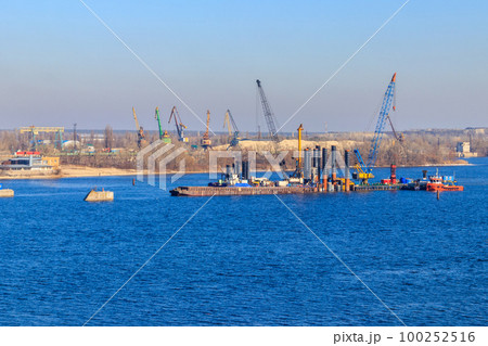 Construction of a new bridge across the Dnieper river in Kremenchug, Ukraine Construction of a new bridge across the Dnieper river in Kremenchug, Ukraine 100252516