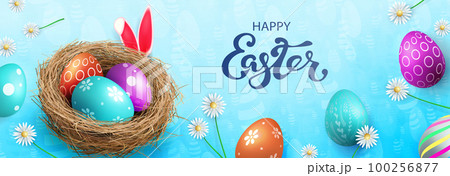 Blue postcard with Easter eggs in the nest, rabbit ears Blue postcard with Easter eggs in the nest, rabbit ears 100256877