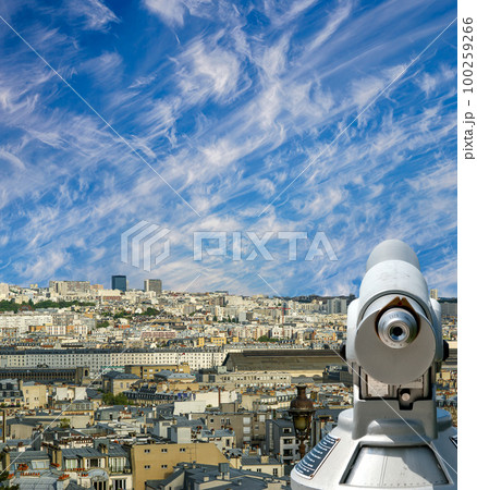 Telescope viewer and city skyline at daytime (against the background of very beautiful clouds). Paris, France. Telescope viewer and city skyline at daytime (against the background of very beautiful clouds). Paris, France. 100259266