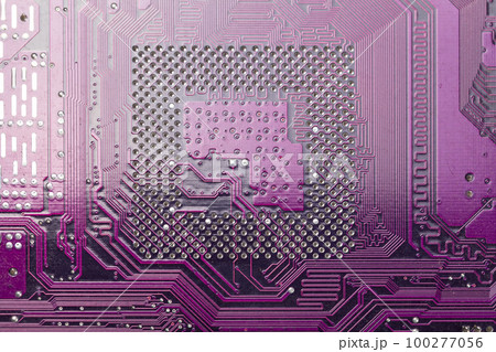 Circuit board background. Close up of a printed purple computer circuit board Circuit board background. Close up of a printed purple computer circuit board 100277056