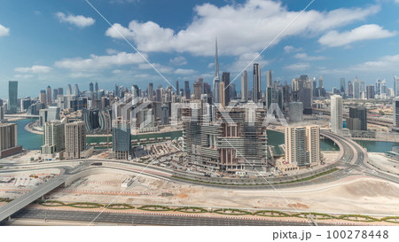 Panorama showing skyline of Dubai with business bay and downtown district timelapse. Panorama showing skyline of Dubai with business bay and downtown district timelapse. 100278448