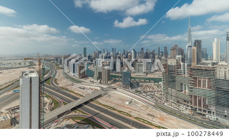 Panorama showing skyline of Dubai with business bay and downtown district timelapse. Panorama showing skyline of Dubai with business bay and downtown district timelapse. 100278449