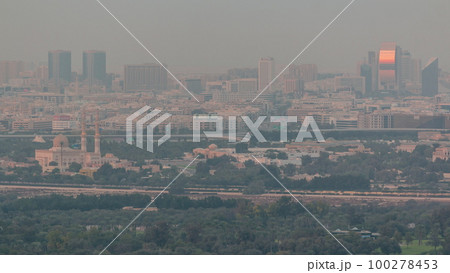 Skyline of the Dubai city with modern skyscrapers in Deira and Zabeel district aerial timelapse Skyline of the Dubai city with modern skyscrapers in Deira and Zabeel district aerial timelapse 100278453