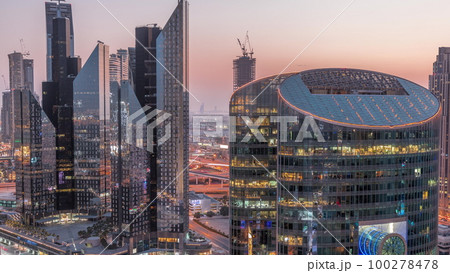 Dubai international financial center skyscrapers aerial day to night timelapse. 100278478