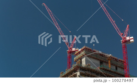 High multi-storey buildings under construction and cranes timelapse High multi-storey buildings under construction and cranes timelapse 100278497