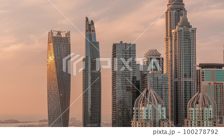 Skyscrapers of Dubai Marina near intersection on Sheikh Zayed Road with highest residential buildings timelapse 100278792