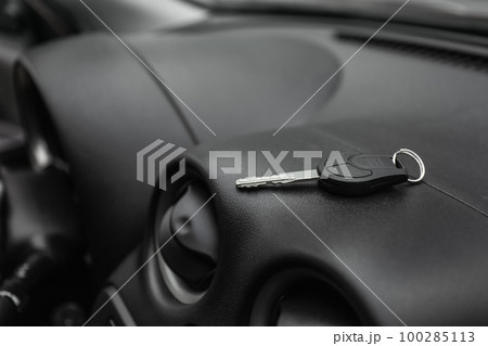 Key in new modern automobile. Car buying Key in new modern automobile. Car buying 100285113