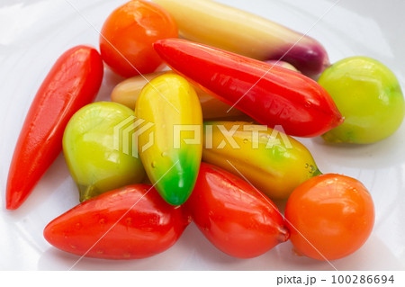 Fruit shaped of mung beans dessert (Kanom Look Choup). Thai Dessert Fruit shaped of mung beans dessert (Kanom Look Choup). Thai Dessert 100286694