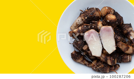 Boiled taro on yellow background. Boiled taro on yellow background. 100287206