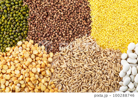 Different grains and cereals as background, top view 100288746