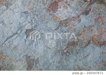 Abstract gray rocky background with red cracks Abstract gray rocky background with red cracks 100307671