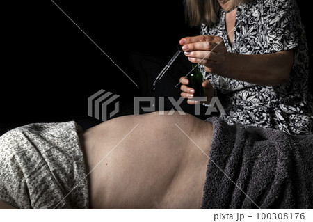 woman and energy healing 100308176