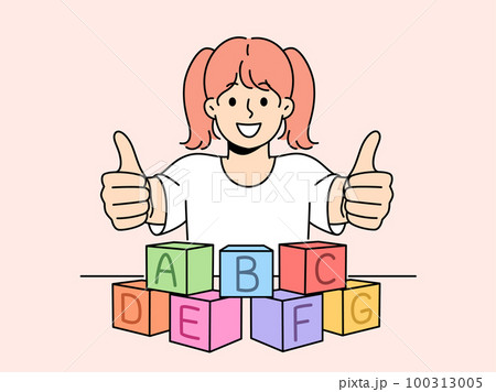 Smiling child learn with blocks with letters 100313005