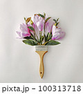 Minimal creative bouquet with flowers and paint brushes for paint.  100313718