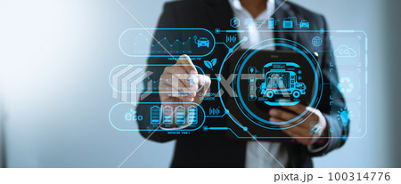 Businesswoman working virtual tablet computer twith reduce CO2 concept with icons, global warming such as reforest green factory recycle in office.. 100314776