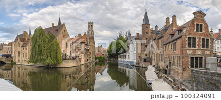 Bruges Belgium, panorama city skyline at Rozenhoedkaai Dijver Canal with Belfry Tower Bruges Belgium, panorama city skyline at Rozenhoedkaai Dijver Canal with Belfry Tower 100324091