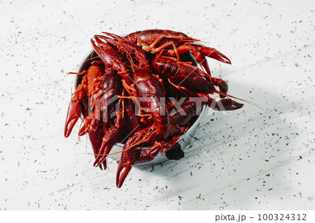 some cooked crayfish in a metal container some cooked crayfish in a metal container 100324312
