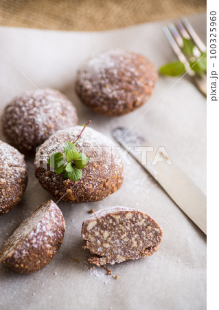 chocolate sweet cakes from mashed biscuits with additives 100325960