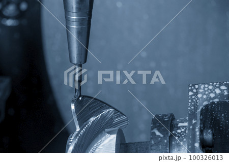 Close up the 5 axis machining center cutting the boat propeller parts  parts with taper ball end mill tool. 100326013