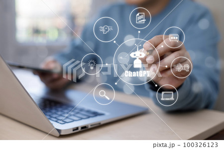 Hand using Laptop or Smartphone With Chat gpt Chat with AI, Artificial Intelligence,System Artificial intelligence an artificial intelligence chatbot, Digital chatbot,robot application, conversation 100326123