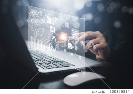 Man using Laptop or Smartphone With ChatGPT Chat with AI, Artificial Intelligence,System Artificial intelligence an artificial intelligence chatbot, Digital chatbot,robot application, conversation 100326814