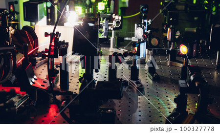 Experiment with laser device in optical laboratory.  100327778