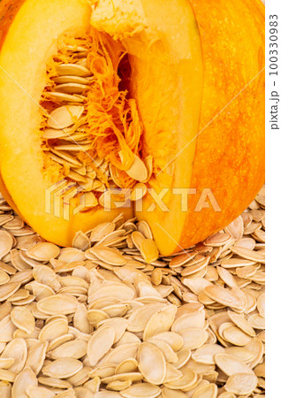 Background of pumpkin seeds and cut pumpkin after drying for food 100330983