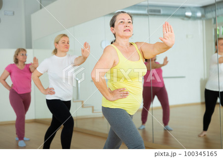 Women are dancing in a fitness room Women are dancing in a fitness room 100345165